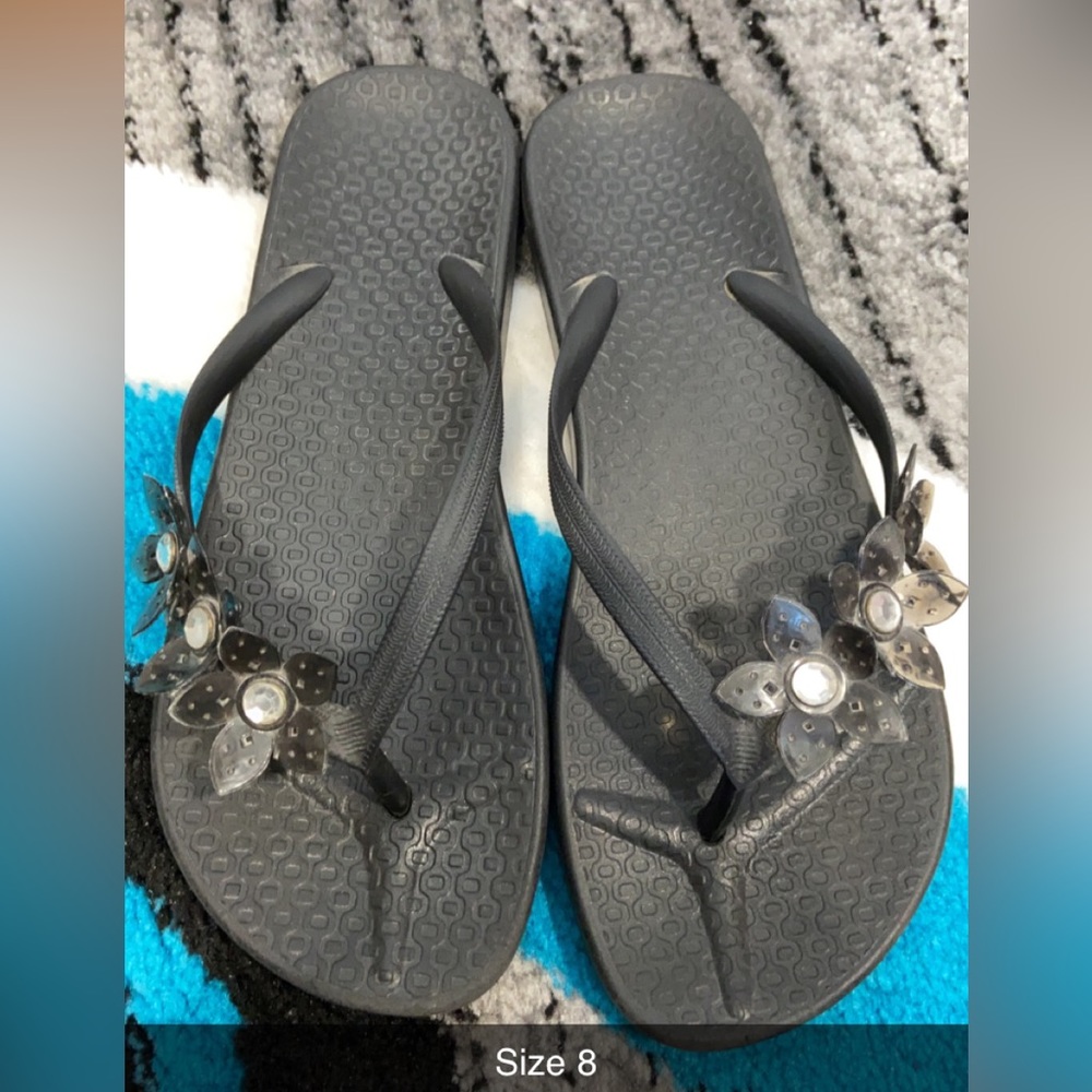 Black flip flops